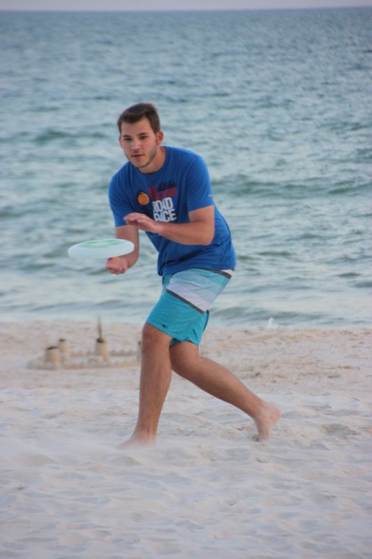 Playing Frisbee at the Beach