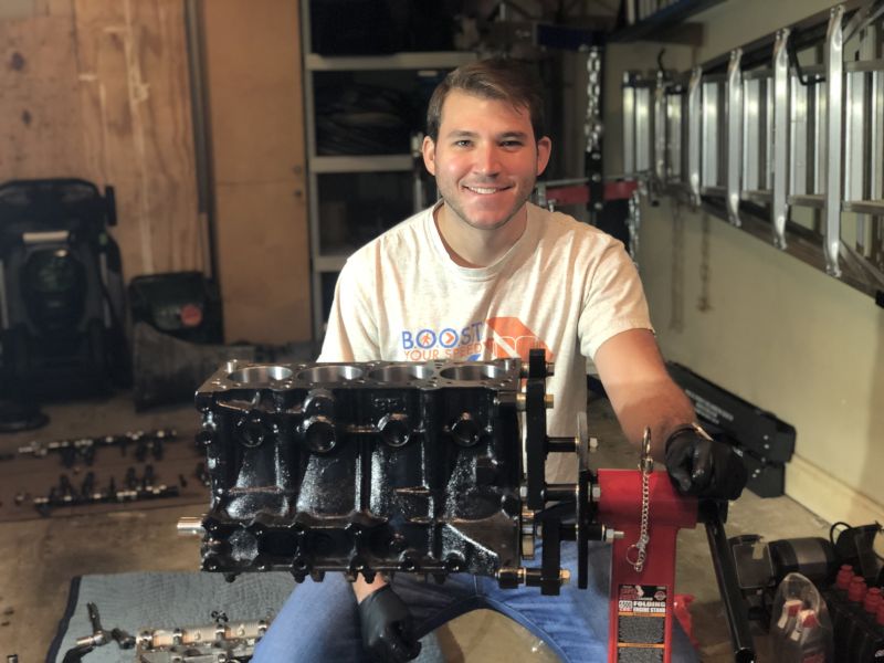 Curtis With the Engine He Built for His Miata