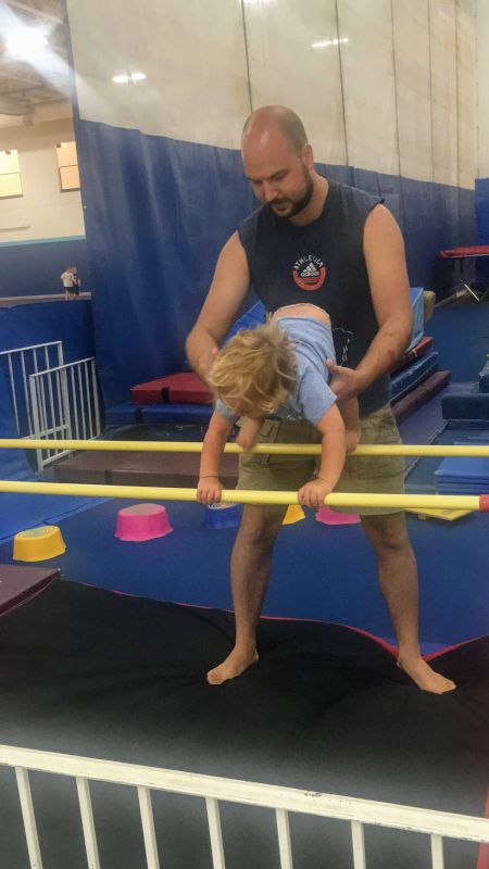 Garrett Helping Clark at His Gymnastics Class