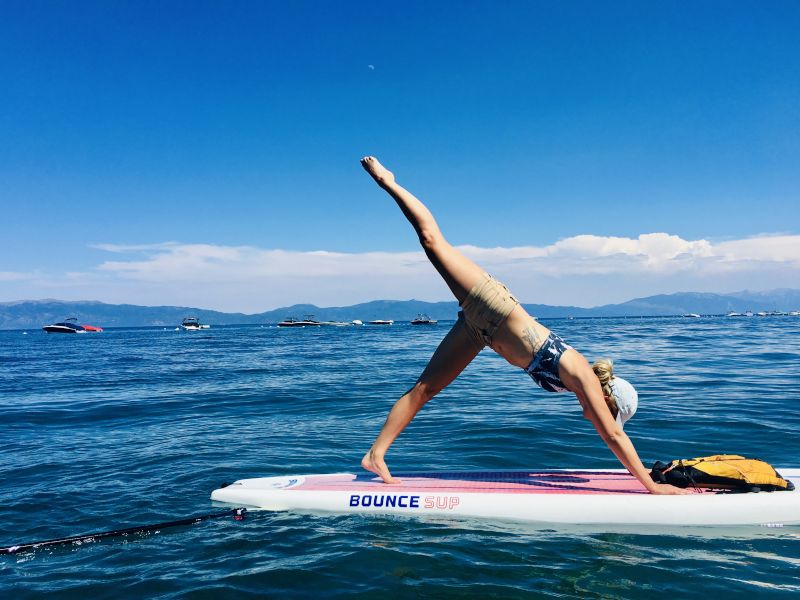 Jenn Doing Paddleboard Yoga