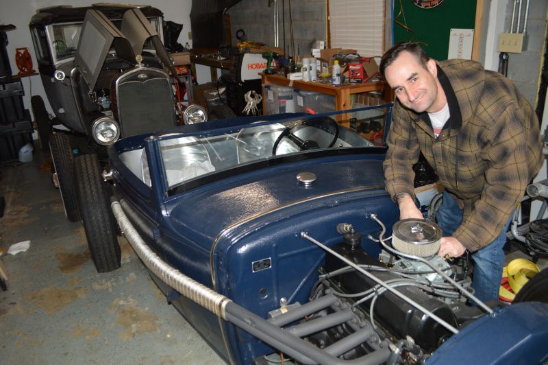 Christian Working on His Hot Rod