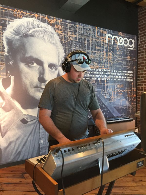 Chris Playing Synthesizer at the Moog Factory