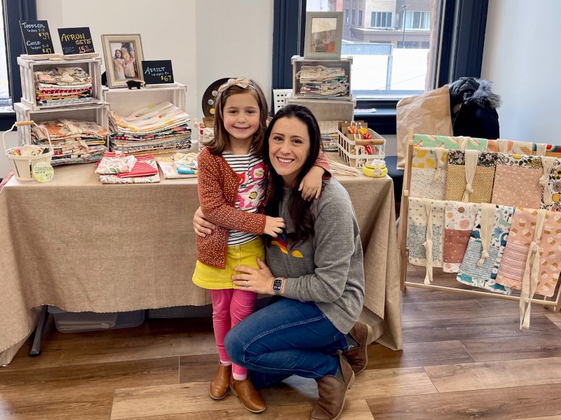 Everly Helping Tara at a Craft Fair
