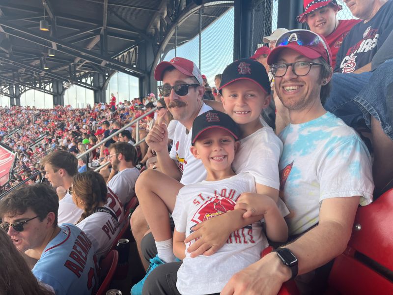 Spencer with his Family at a Baseball Game