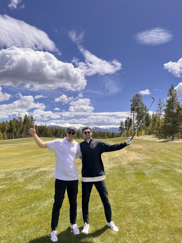 Colby Playing Golf with His Brother