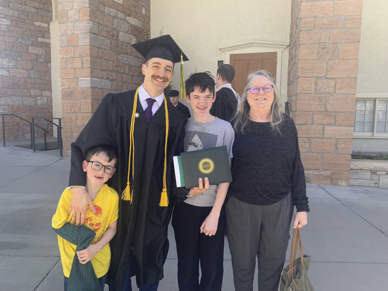 Celebrating His Graduation With His Sons and Mom