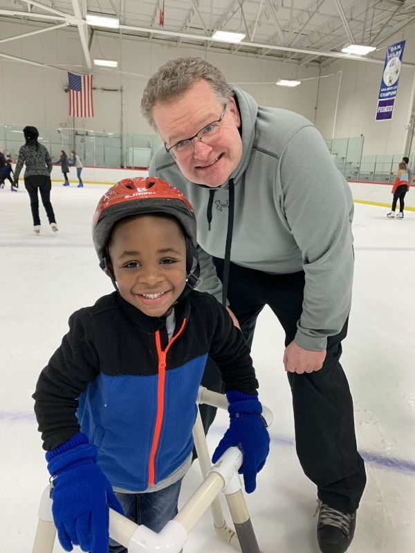 Uncle Bruce Teaching Our Nephew How to Skate
