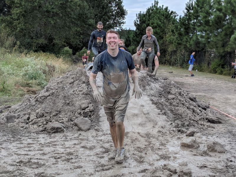 Andrew Finishing a Mud Run