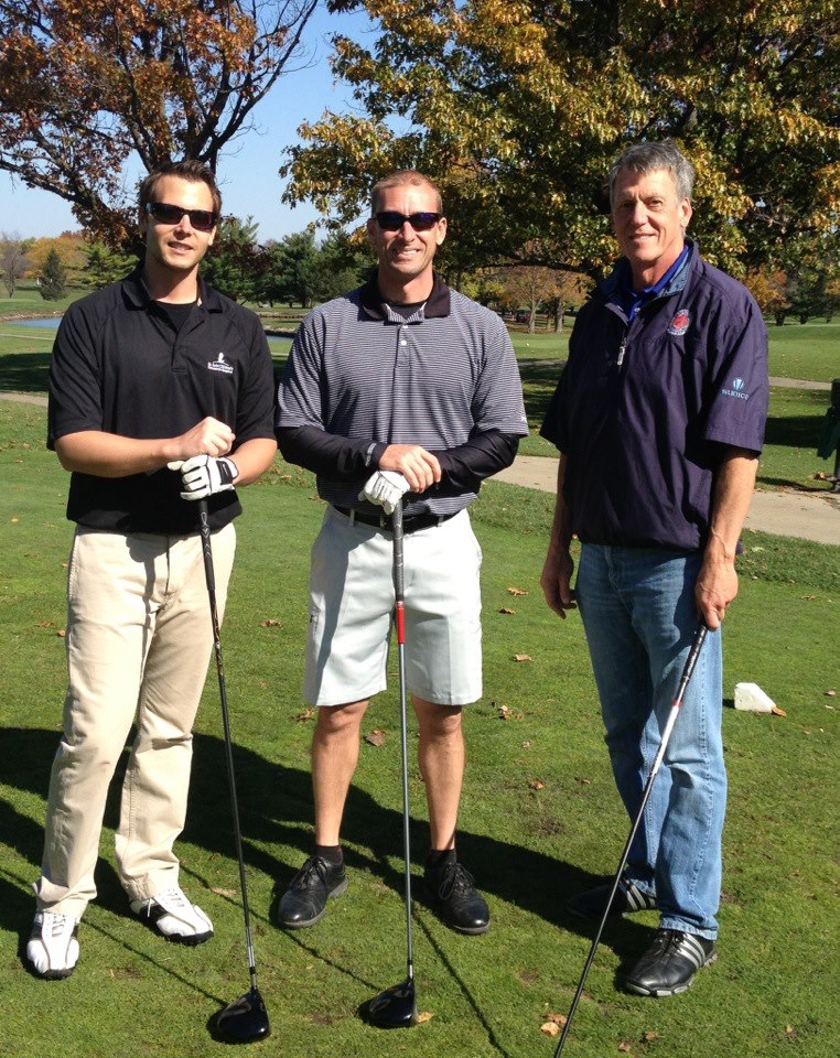 Golfing with His Dad & Brother