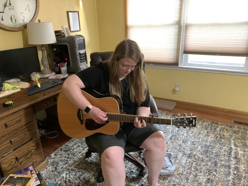 Meghan Playing Guitar
