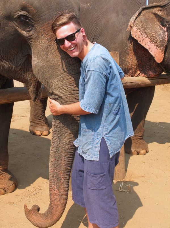 Kyle Hugging an Elephant in Thailand