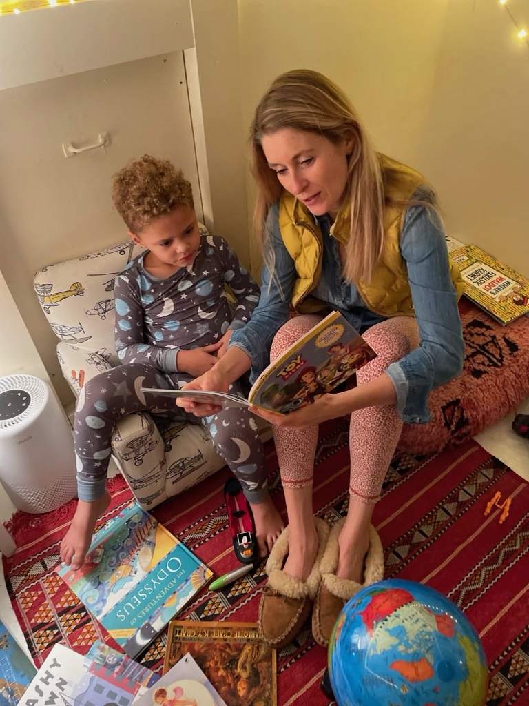 Katrina Reading to Her Godson