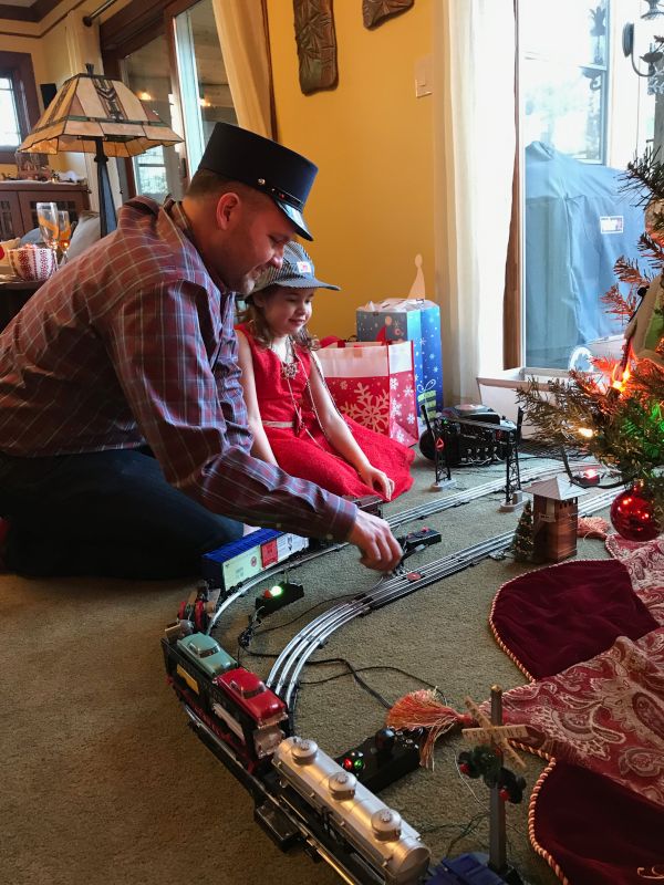 Matt and Our Niece Playing Trains