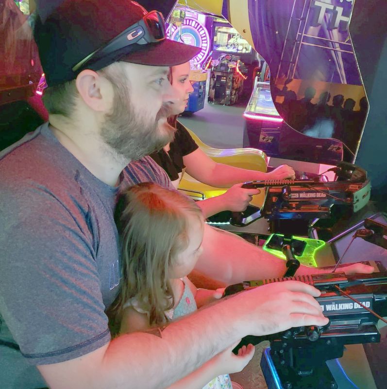 At the Arcade With Our Niece