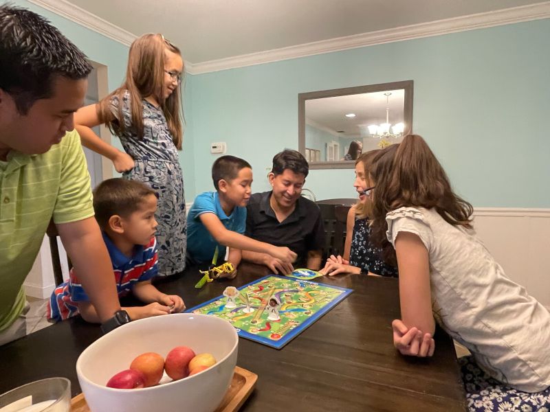Playing Chutes & Ladders With the Kids